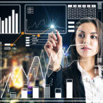 Attractive young businesswoman using abstract digital business interface on blurry city background. Finance and innovation concept. Double exposure