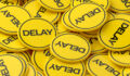 This 3D animation vividly illustrates the concept of delay and interruption. A large pile of yellow badges, each marked with the word "DELAY," creates a powerful visual metaphor for setbacks, waiting, and missed deadlines. This abstract background is ideal for presentations and articles on project management, supply chain issues, travel disruptions, or any scenario involving postponement and the challenges of Wasting Time. The bright yellow color serves as a universal sign of caution, reinforcing the message of a schedule on hold.