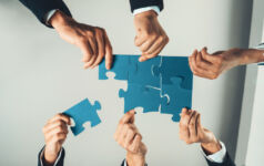Top view panorama banner of business team assembling jigsaw puzzle over table symbolize business partnership and collective teamwork for HR recruitment and job seeker background. Shrewd