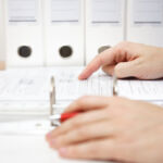attorney is examining business documentation