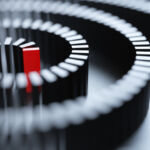 Red domino for leadership concept