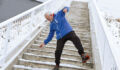 Senior man on a icy staircase
