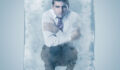 Businessman frozen in an Ice Cube