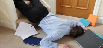 Business man falling down the stairs in the office concept for accident and insurance injury claim at work