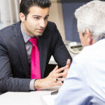 Senior man talking to a financial advisor or banker. You might also be interested in these: