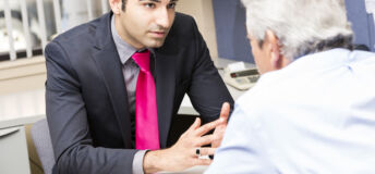 Senior man talking to a financial advisor or banker. You might also be interested in these: