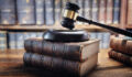 Judge gavel and law books in court, law and justice background concept