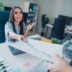 Photo of smart chief female secretary boss take report papers wear striped formalwear comfortable modern office interior indoors workspace.