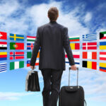 International business man travel with trolley, global business concept