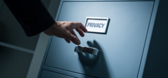 Office worker searching top secret confidential information in the office late at night, data theft and security concept