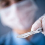 Surgeon scalpel, Hand, Lancet, Blue on background