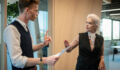 A business woman resists bullying and physically fights back against an abusive man in self-defense.