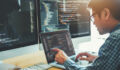 Developing programmer Development Website design and coding technologies working in software company office
