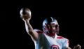 American football player holding a ball royalty-free istock photo