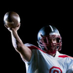 Hoping for a reversal of fortune on enforcement American football player holding a ball royalty-free istock photo