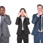 portrait of multicultural young business people covering parts of faces isolated on white