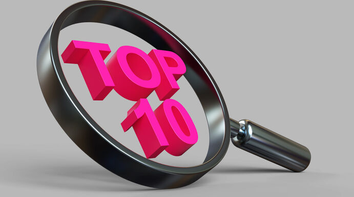 Top 10 sign with Magnifying Glass. Rating header.
