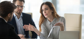 Dissatisfied executive manager having conflict with employee about financial report mistake, disgruntled clients claim complaint disputing about bad contract terms meeting lawyer, legal fraud concept
