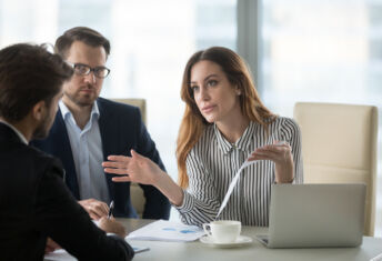Dissatisfied executive manager having conflict with employee about financial report mistake, disgruntled clients claim complaint disputing about bad contract terms meeting lawyer, legal fraud concept