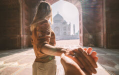 Template to help guide Reg S-P compliance Follow me to the Taj Mahal, India. Female tourist leading boyfriend to there magnificent famous Mausoleum in Agra. People travel concept