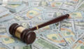 judge gavel with banknotes, dollars, money. concept of law and legal services